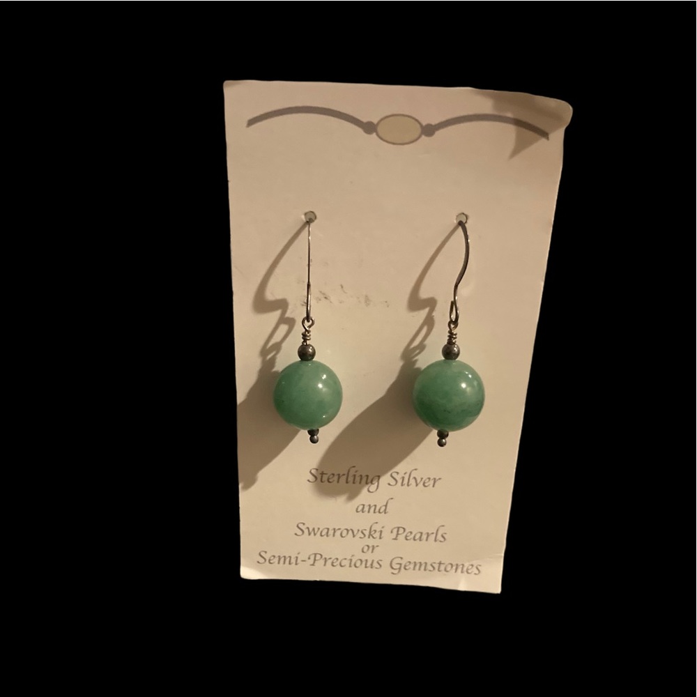 Sterling silver earrings with semi precious green stone